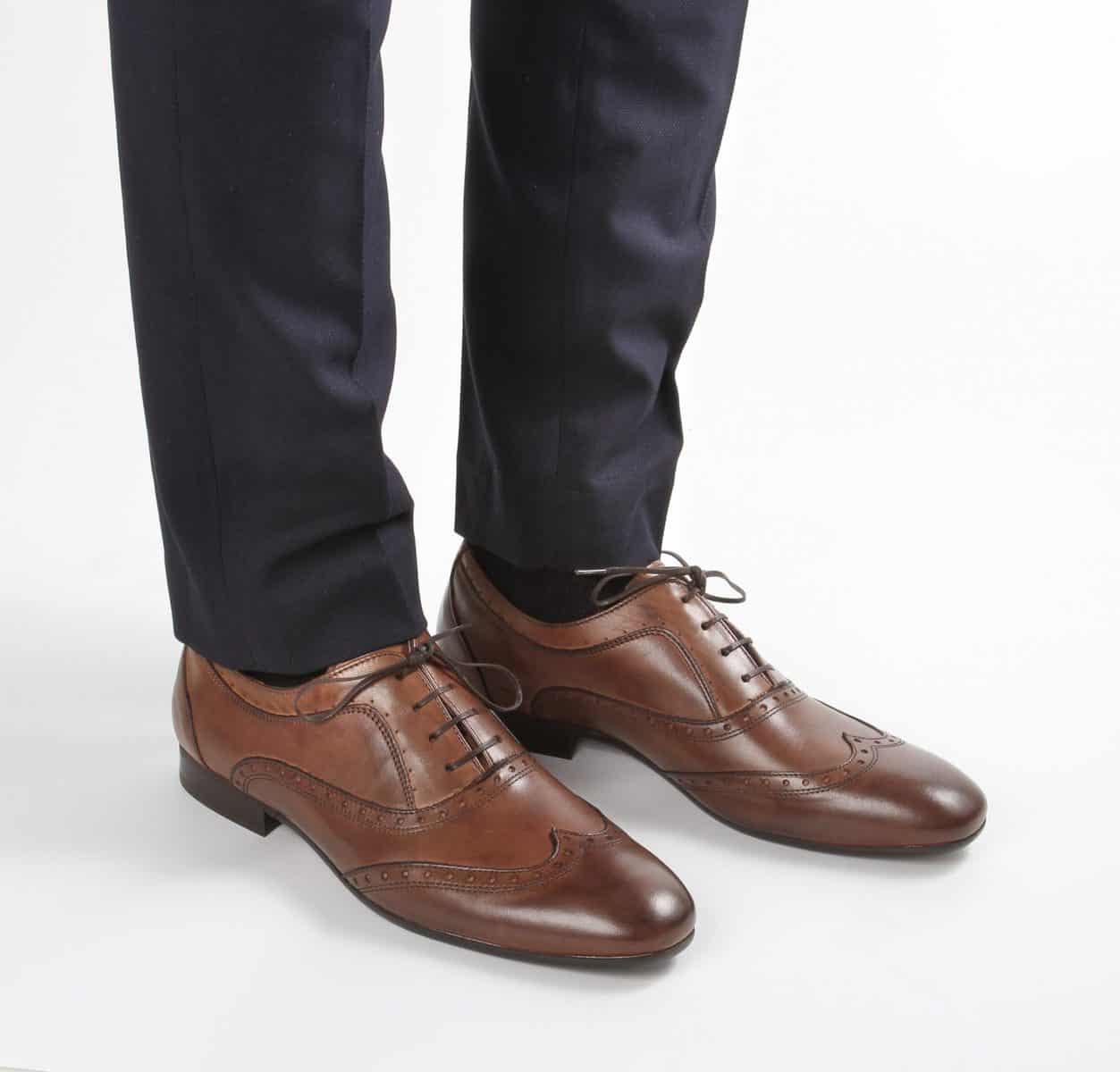 grey and tan shoes