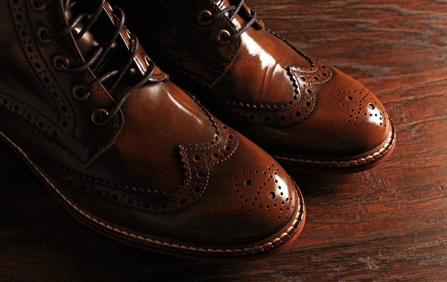 black coat pant with brown shoes